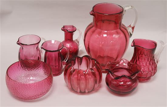 A small collection of cranberry glassware tallest 20cm